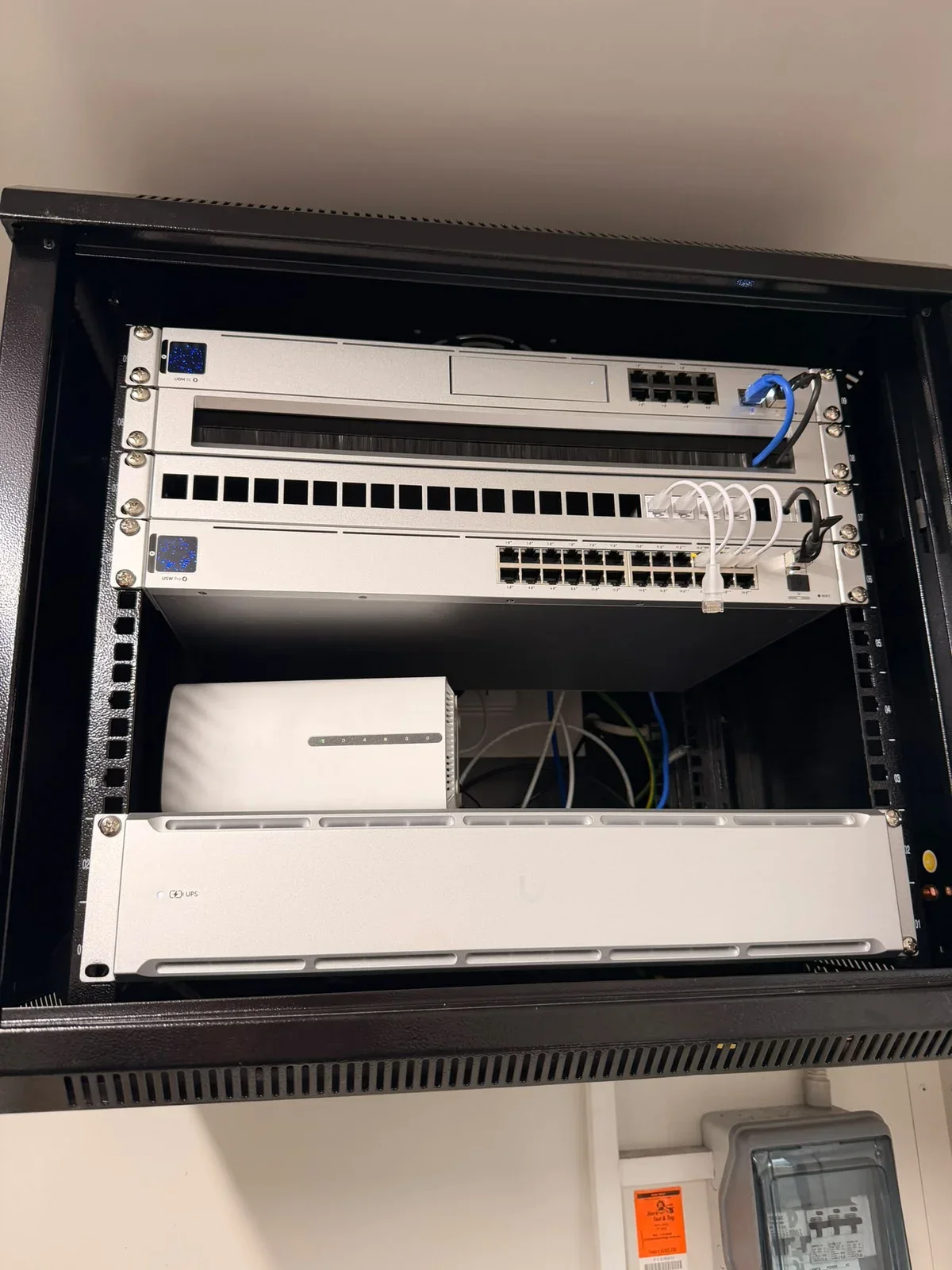 Rockingham mobile office after the upgrade, with the new rack, UniFi equipment and organised patch cabling